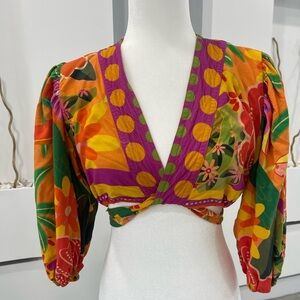 Vibrant Patchwork Blouse with Floral Accents